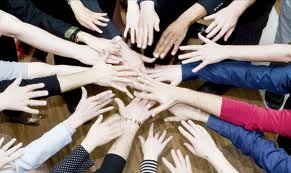 hands connected for teamwork and collaboration