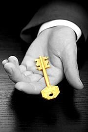 hand giving the key to safety success